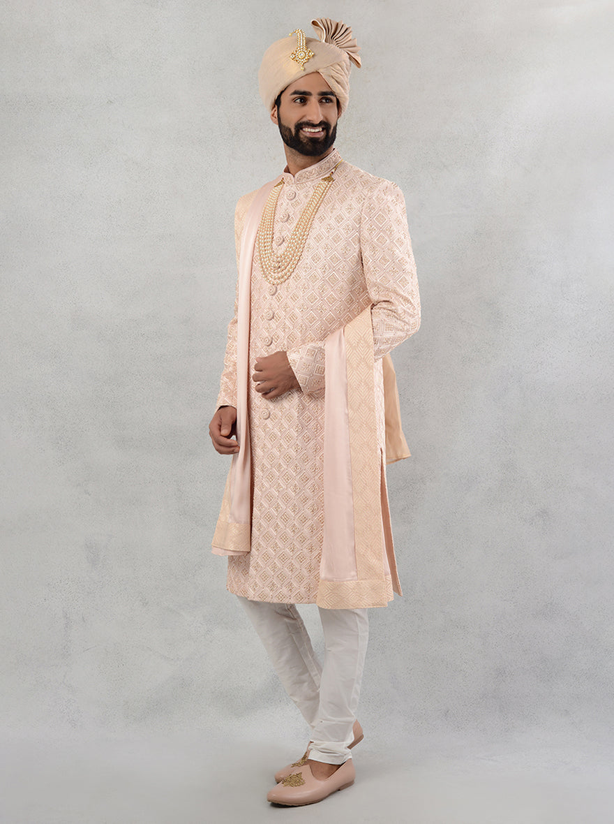 Perfect for both weddings and special occasions, this onion pink silk blend sherwani combines luxury and elegance, ensuring you stand out in the USA.