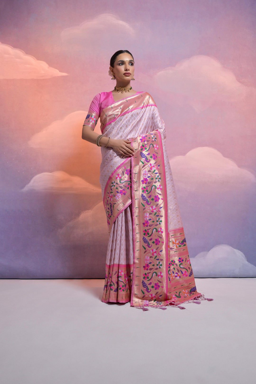 Elegant USA Banarasi saree with rich zari pallu and tassels, crafted for weddings