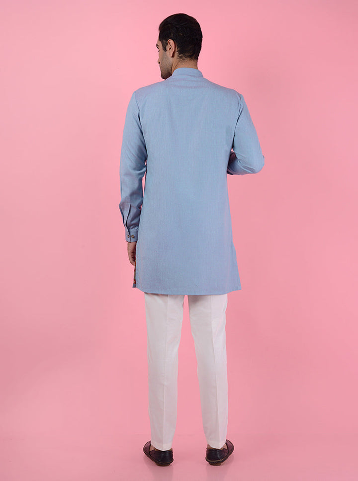 Discover timeless sophistication with this blue kurta pajama set, perfect for men celebrating in the USA.