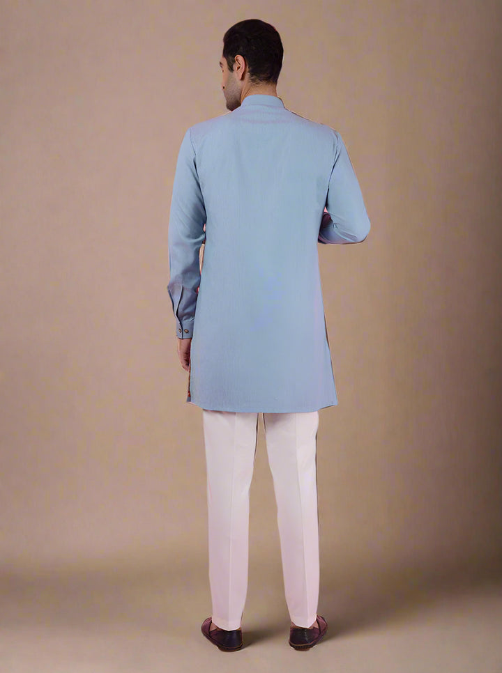 Men's sky blue kurta pajama, crafted from silk blend for a traditional yet stylish look.