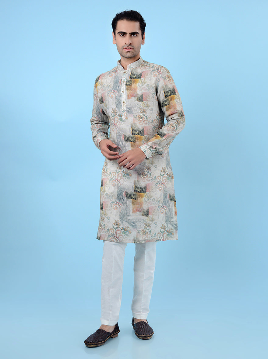 Men's green kurta pajama set in linen, ideal for traditional celebrations with a modern touch.