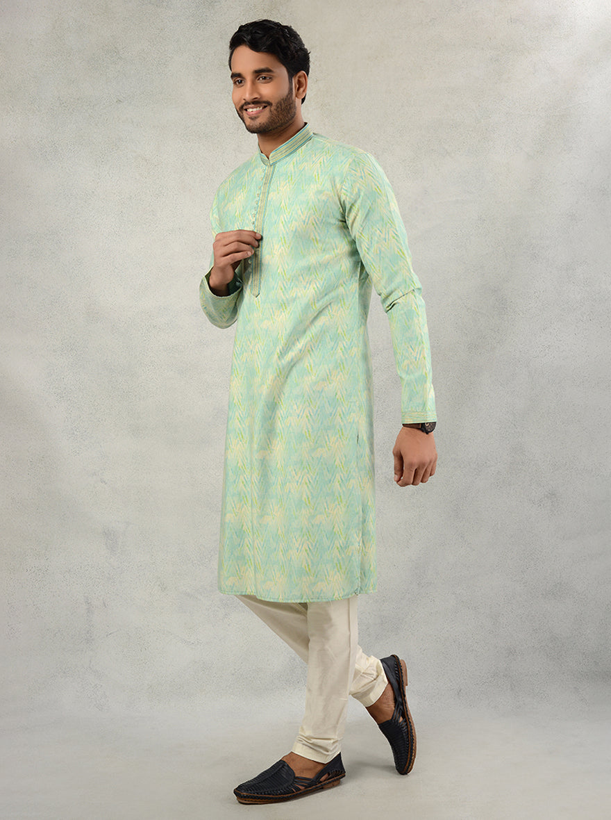 Ideal for family gatherings, this Aqua Green silk blend kurta ensures you make a stylish statement.