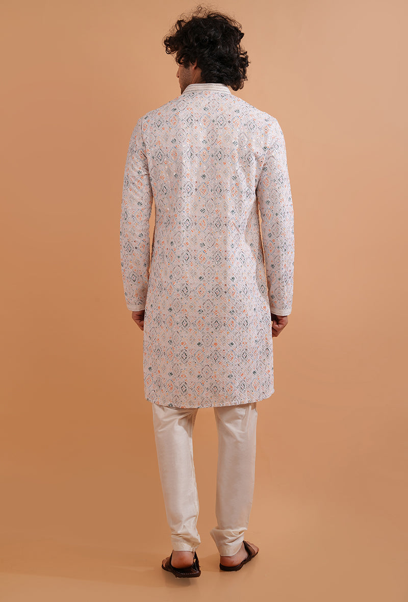 Enjoy stylish charm in this embroidered white kurta pajama for men, perfect for cultural celebrations in the USA.