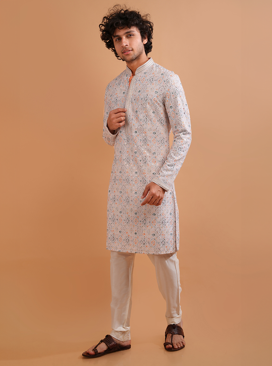 Shine in this beautiful white kurta pajama, designed for modern sophistication at traditional events in the USA.