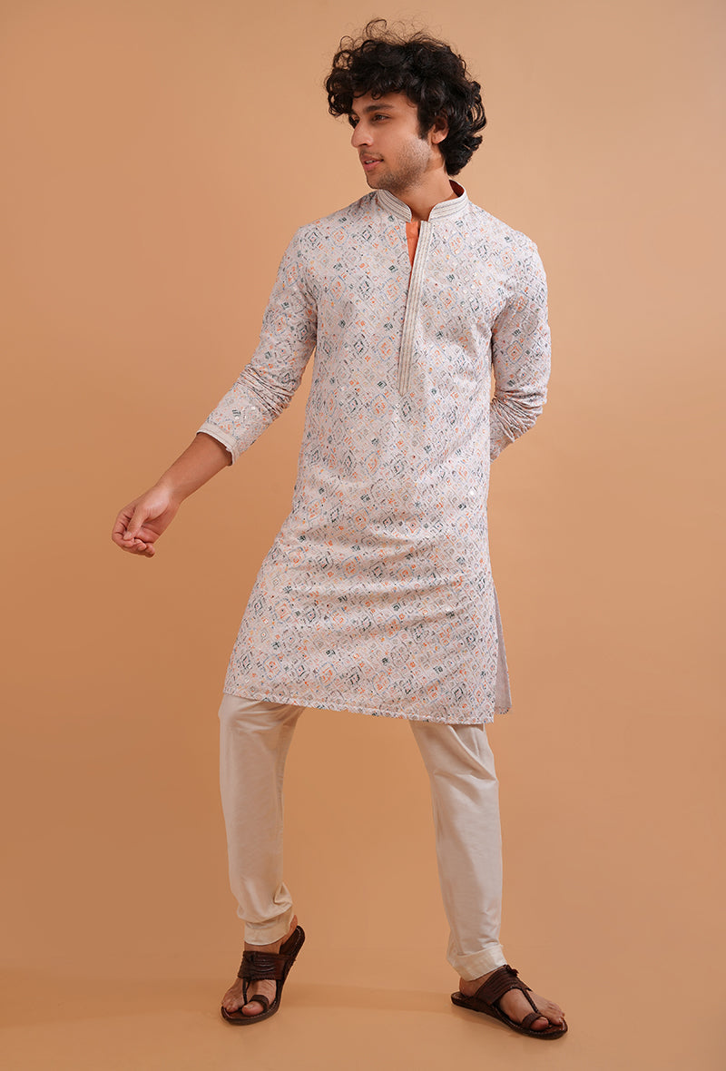 Celebrate in style with this elegant white kurta pajama, designed for special occasions in the USA.