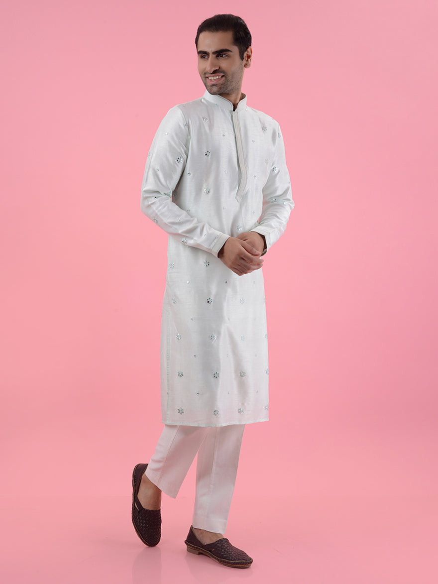 Mint green embroidered kurta pajama set, designed for men’s traditional and festive wear.