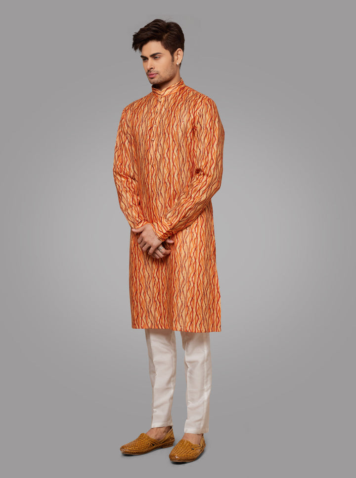 Elegant men's orange kurta pyjama with beautiful embroidery, perfect for enhancing your festive wardrobe in the USA.