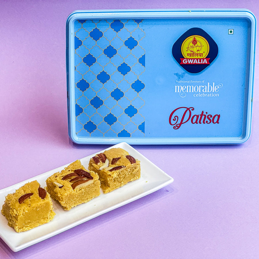 Patisa, a crispy, layered Indian sweet made with gram flour and sugar, offering a delightful crunch and melt-in-the-mouth experience.
