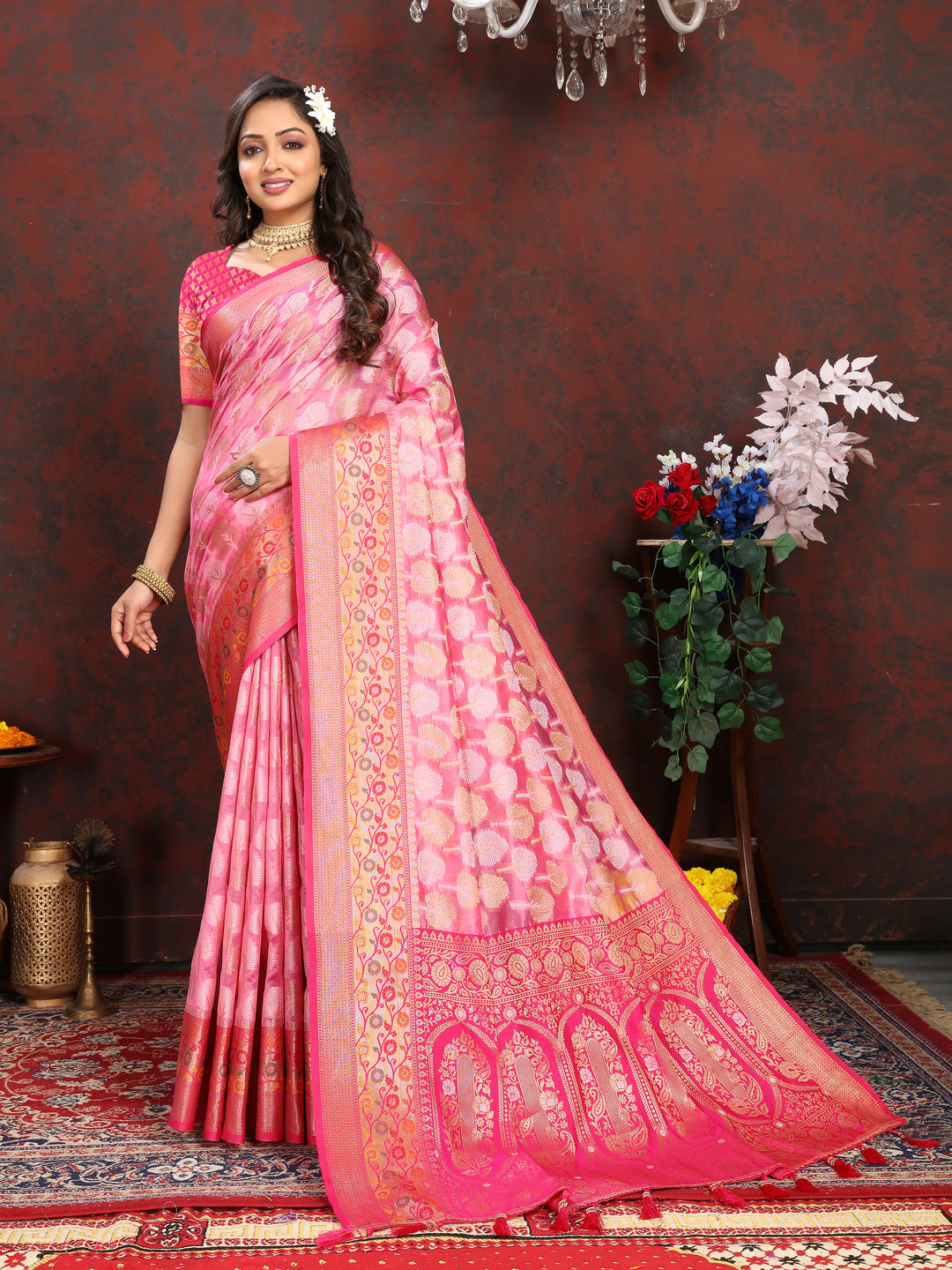 Elegant pink Meenakari Organza silk saree with luxurious weaving, perfect for Indian events.