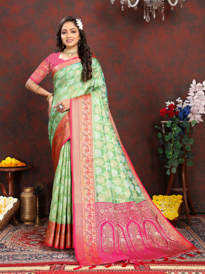 Luxurious pink Meenakari Organza silk saree with detailed weaving, ideal for weddings.