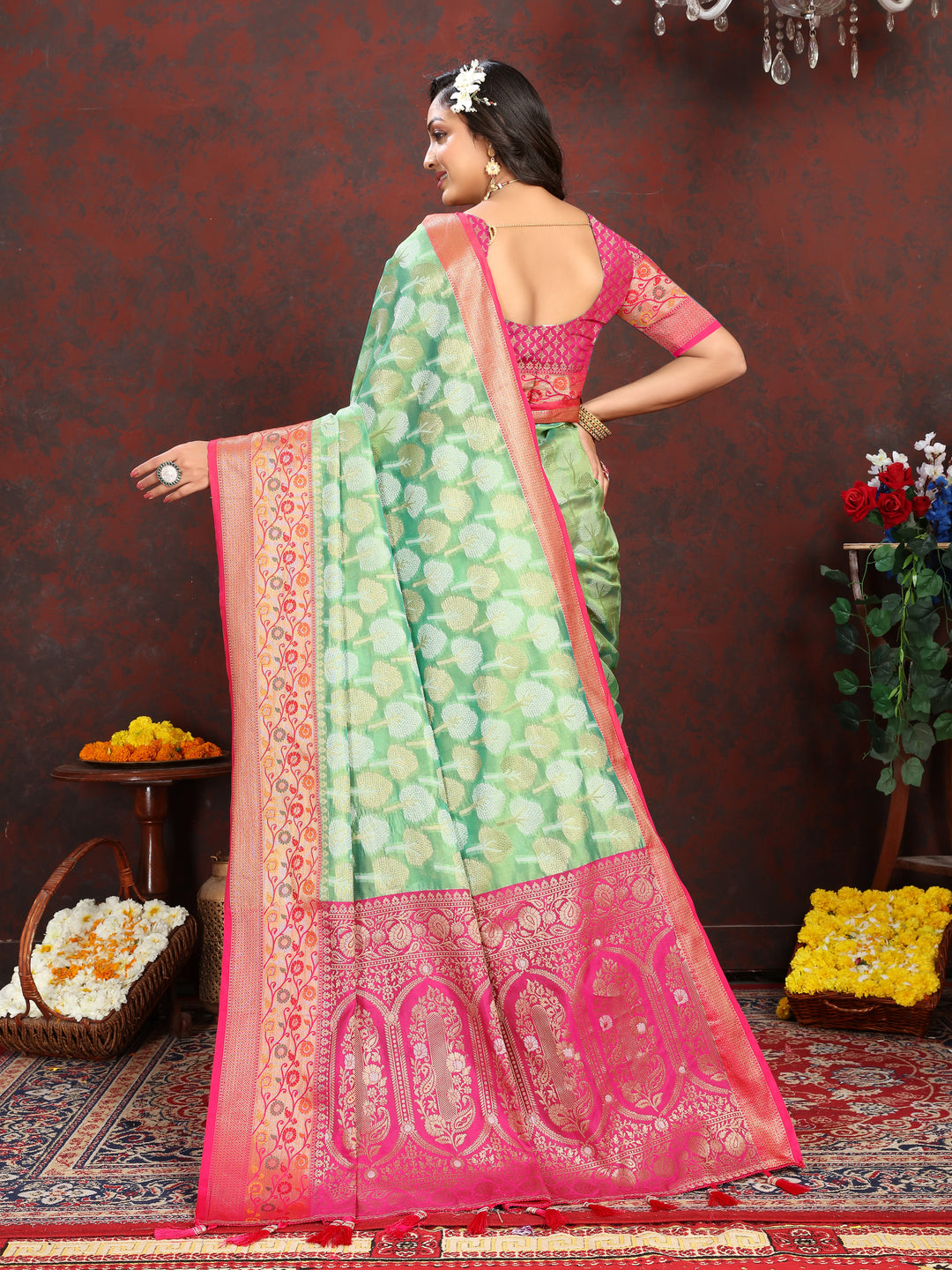 Designer pista green Meenakari Organza silk saree with luxurious weaving, ideal for weddings.