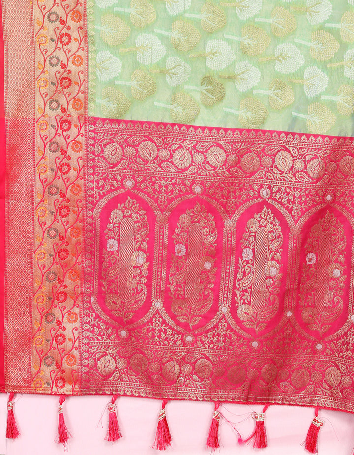 Beautiful pista green Organza silk saree featuring intricate Meenakari artistry, perfect for festivals.