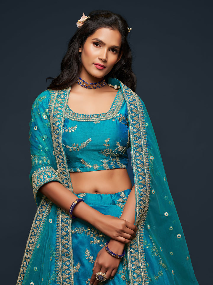 Traditional teal blue lehenga dress with attached can-can inside