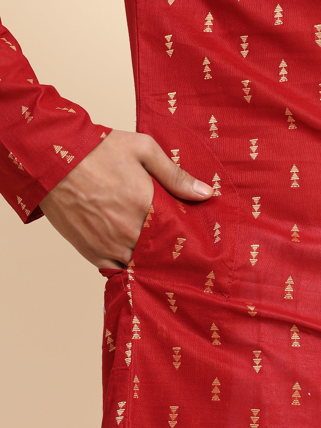 Festive men's kurta set with red cotton fabric and art silk bottoms.