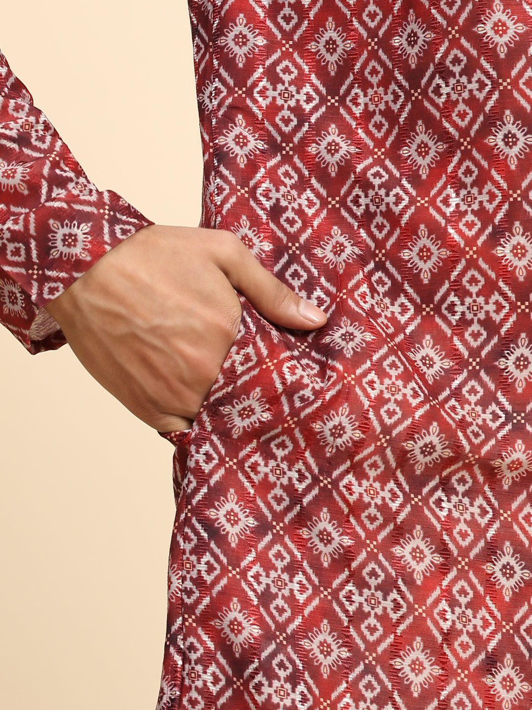 Red kurta pajama set for men with modern geometric print, ideal for Sangeet events.