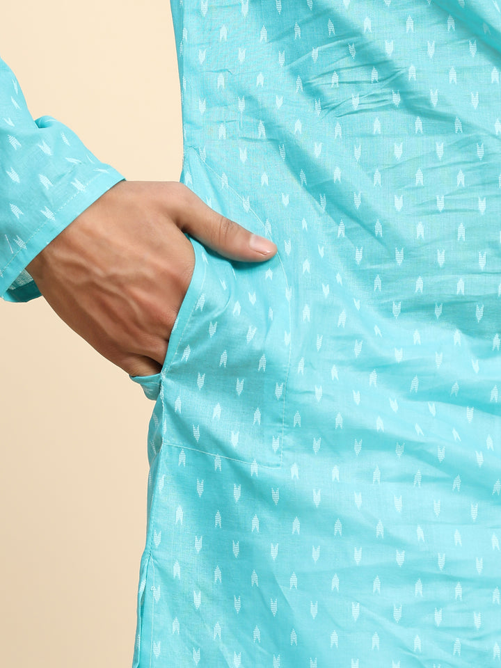 Traditional cyan blue kurta pajama for men with intricate handwoven motifs.