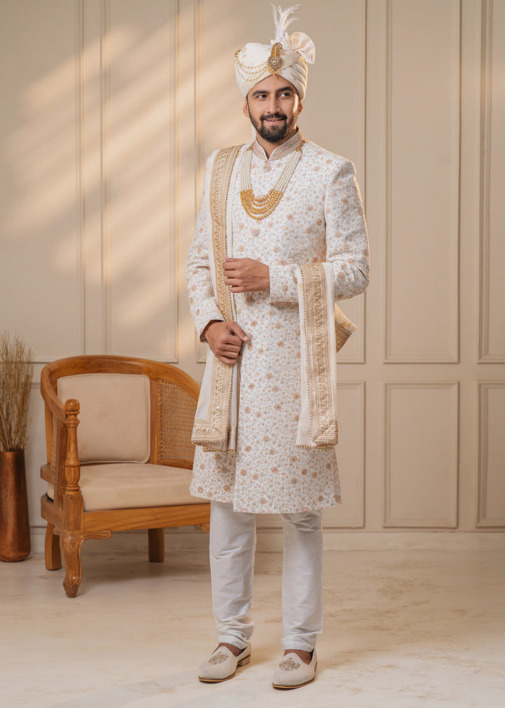 Stand out on your special day with this exquisite off-white sherwani, designed for modern grooms in the USA.