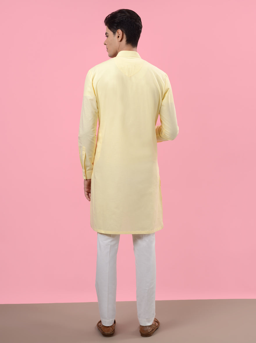 Lemon yellow kurta pajama for men, crafted to enhance your festive wardrobe.