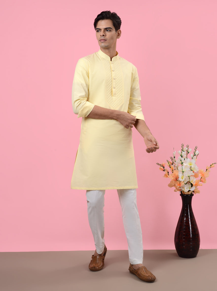 Unique lemon yellow kurta pajama designed for family gatherings and festive occasions.