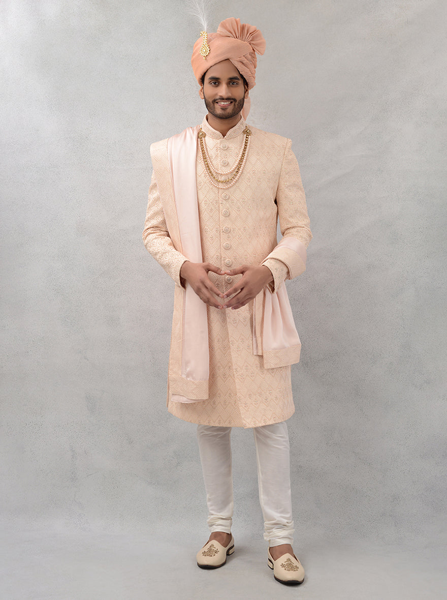 Make a memorable entrance at weddings and events in the USA with this elegant peach embroidered sherwani, crafted for both style and comfort.