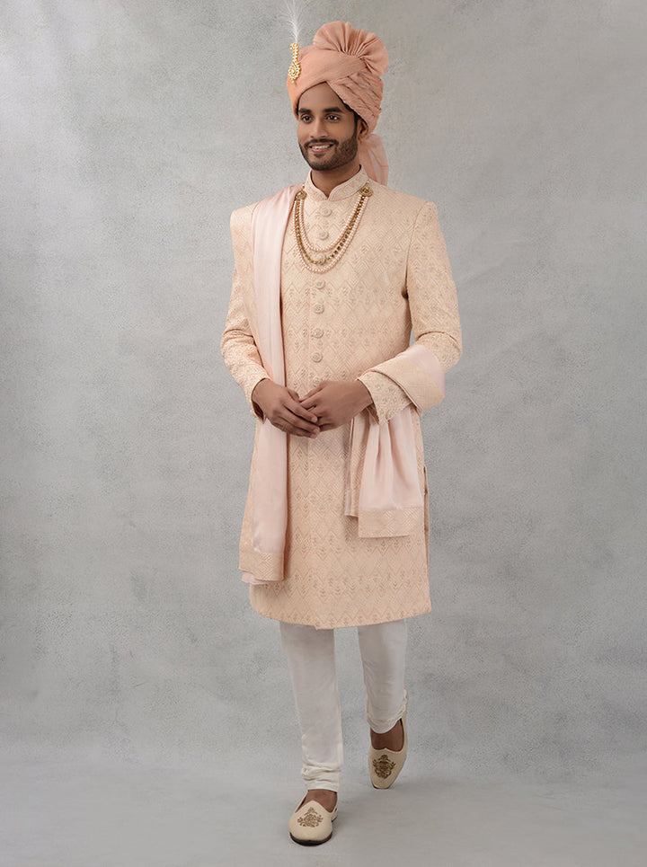 Experience the perfect combination of tradition and modernity with this peach embroidered sherwani, ideal for confident grooms in the USA.