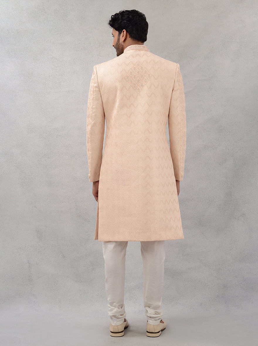 Elevate your wedding attire with this peach sherwani, designed for comfort and style, making you feel confident on your special day in the USA.