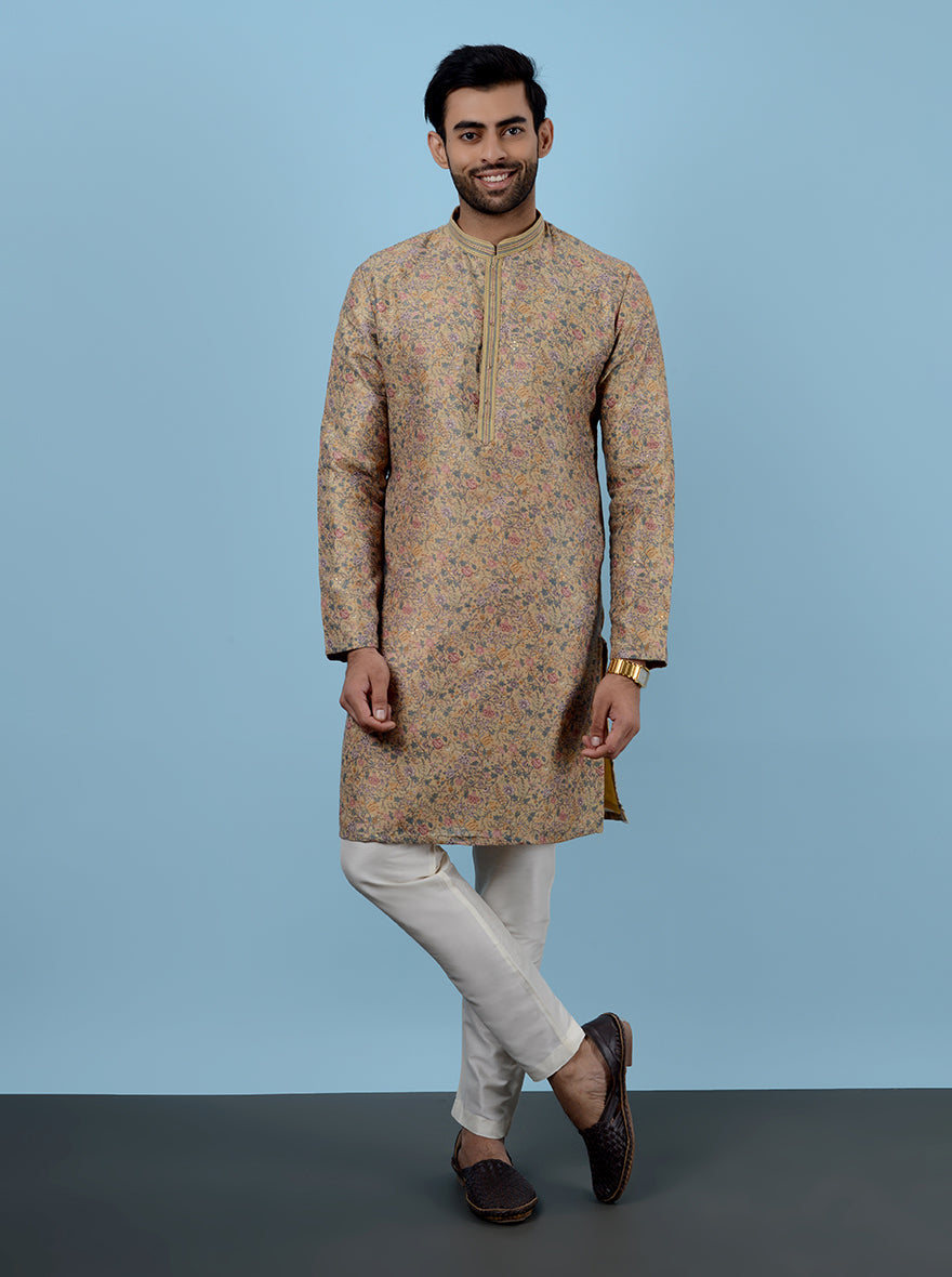 USA men’s mustard kurta pajama, festive haldi and mehndi attire with embroidery.