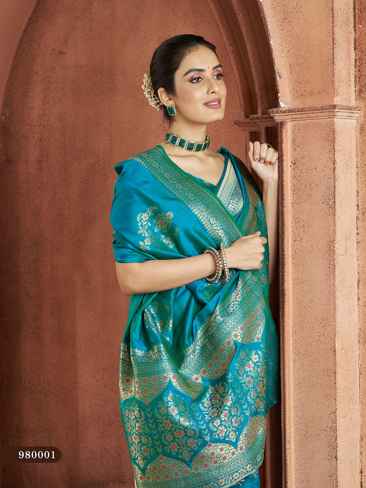 Beautiful teal-blue Banarasi saree with luxurious silk blouse, perfect for Indian weddings.