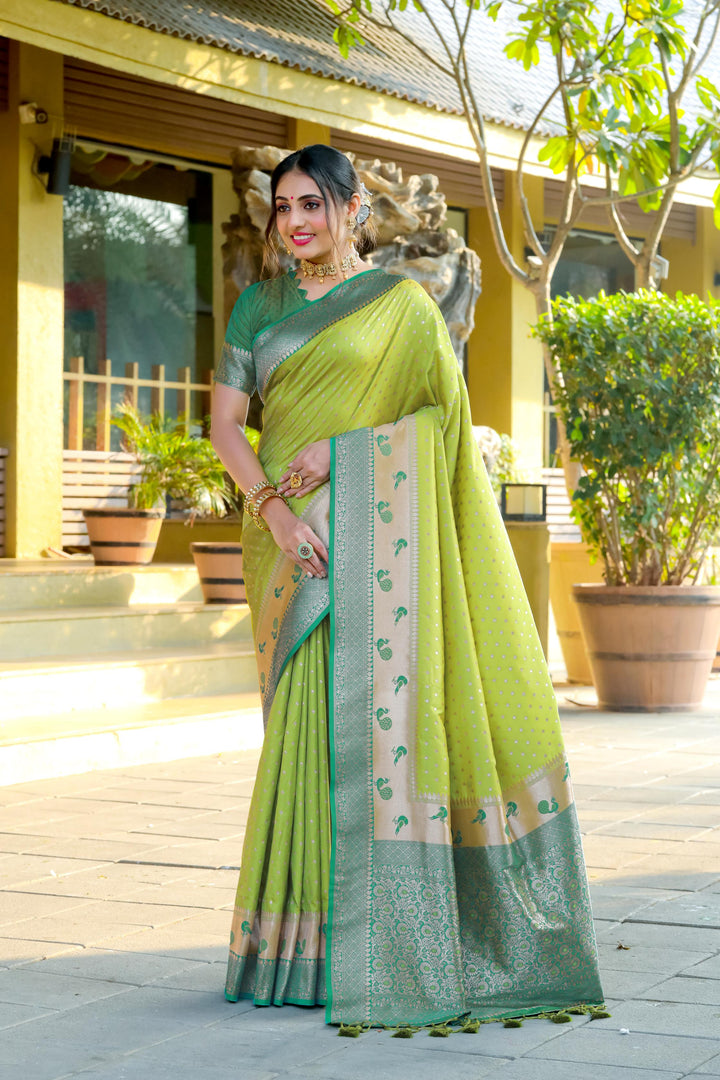 Designer Olive saree with a stunning contrast peacock border and zari pallu. Ideal for festive occasions or a traditional Indian wedding.