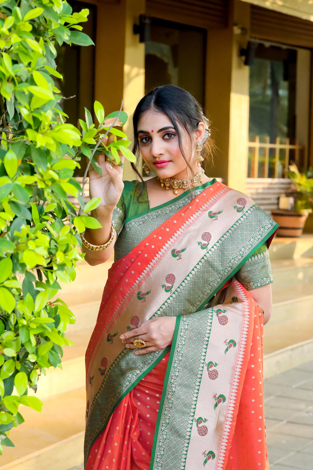 Elegant Peach Indian saree with peacock border and exclusive zari pallu. Complete with a contrast blouse piece, perfect for festive occasions.