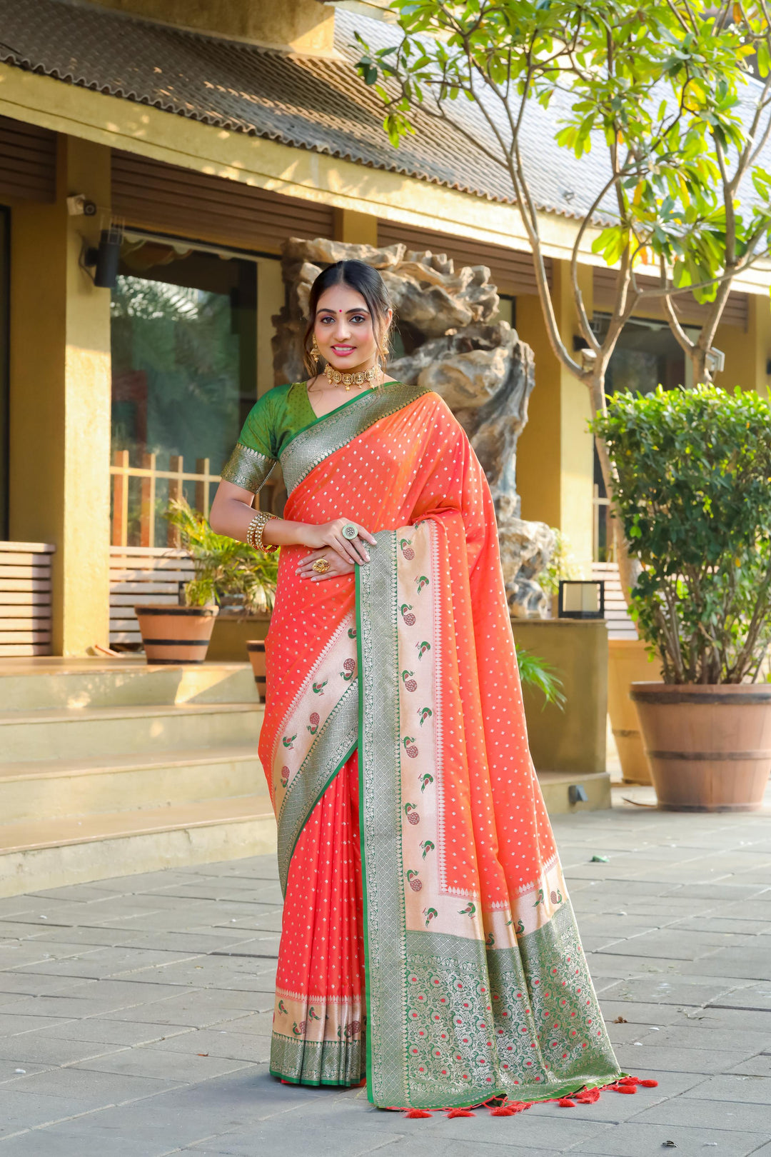 Traditional Peach Indian sadi with peacock border, zari pallu, and matching blouse piece. Perfect for Indian weddings or cultural celebrations.