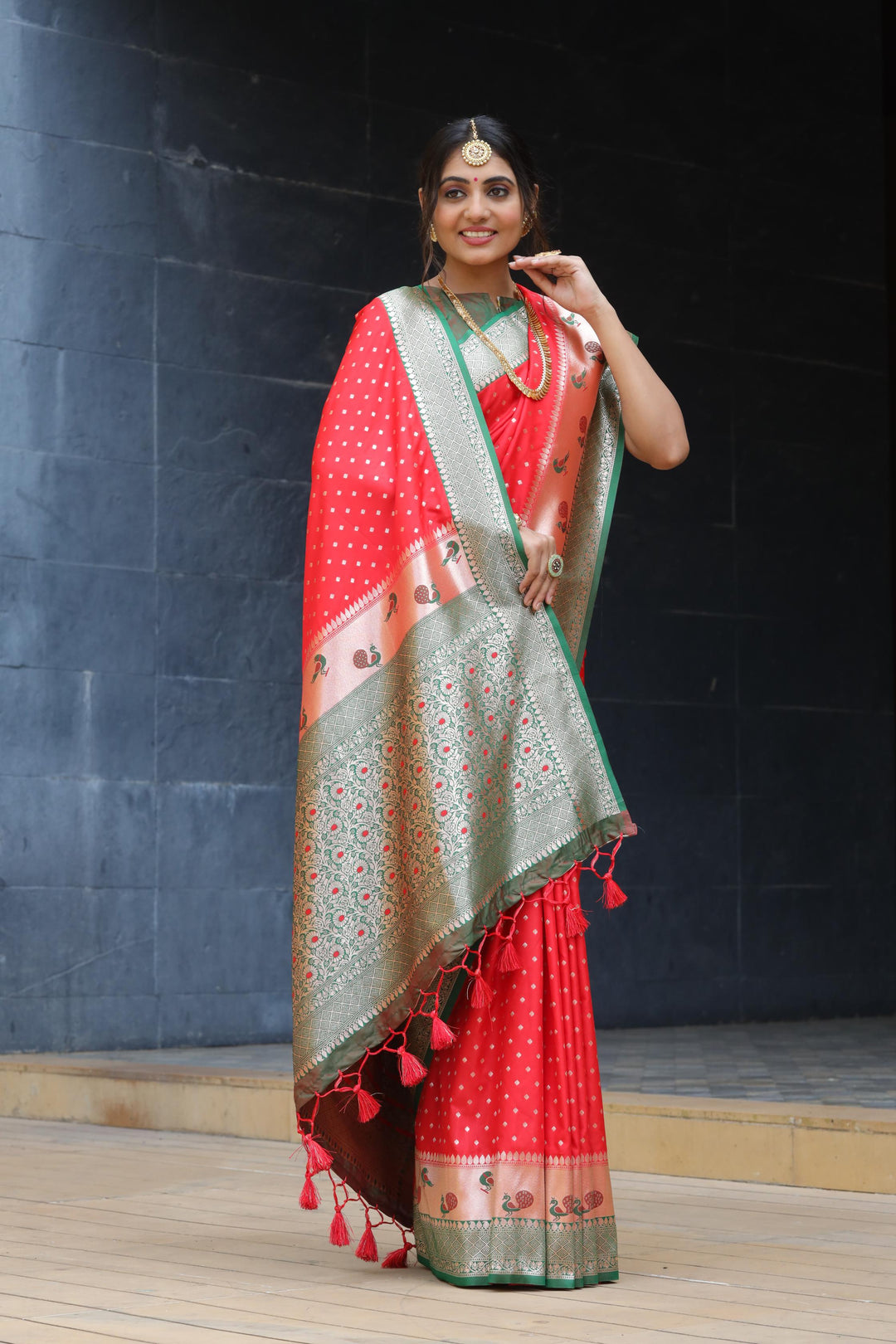 Traditional Red Indian saree with a gorgeous peacock border and zari pallu. Perfect for adding elegance to weddings and festive occasions.