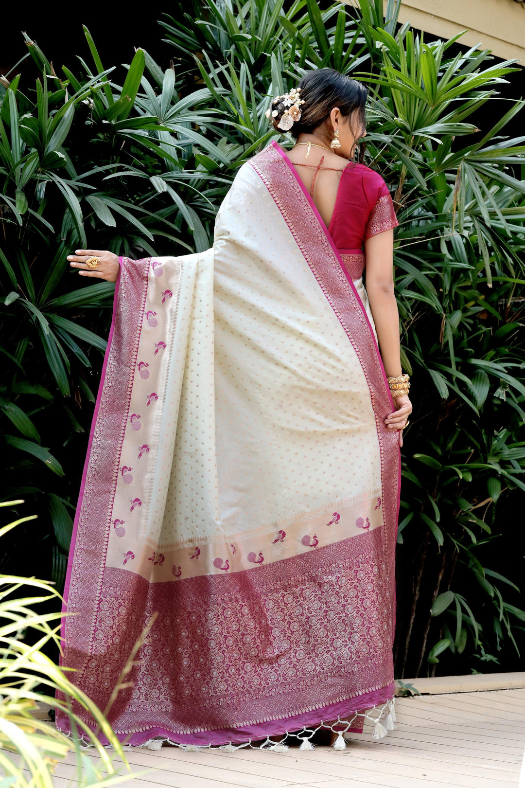 Elegant Yellow saree with Banarasi, peacock border, and intricate zari pallu. Perfect for weddings and cultural celebrations.