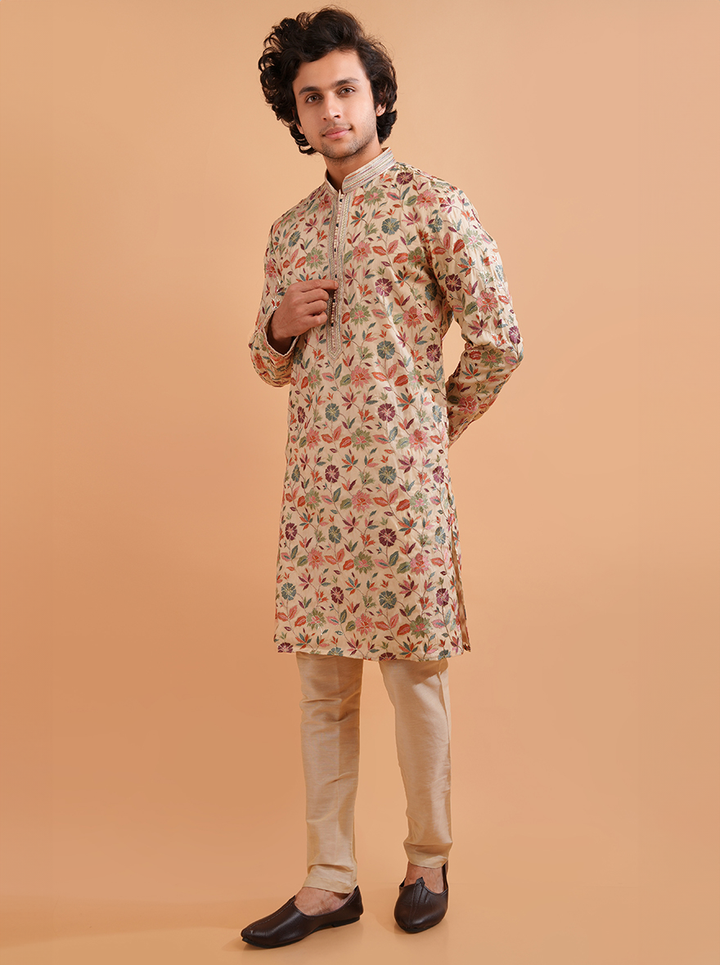 Cream silk blend kurta pajama set for men, designed with resham embroidery for cultural wear.