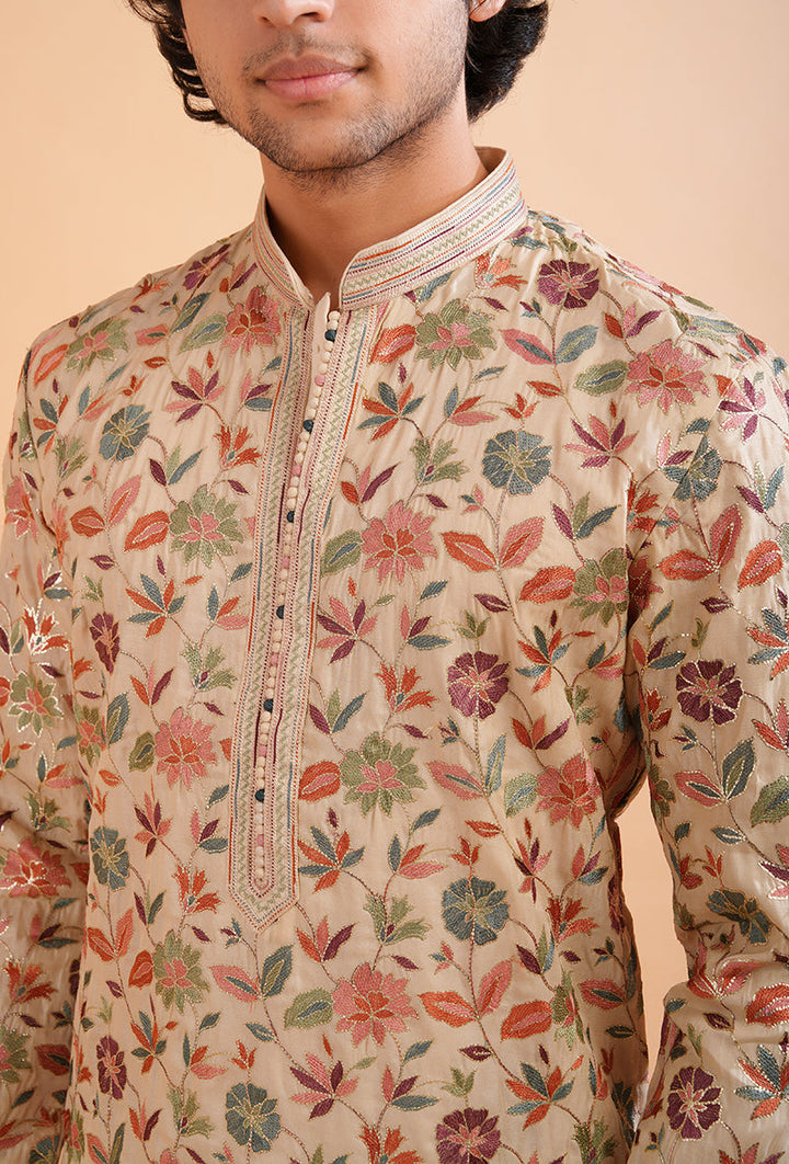 Men's cream silk blend kurta pajama set, featuring exquisite resham embroidery for ethnic wear.