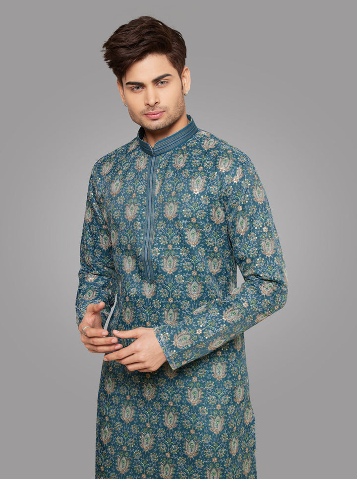 Traditional Rama Green Kurta Pajama set for men with luxurious silk fabric and embroidery.