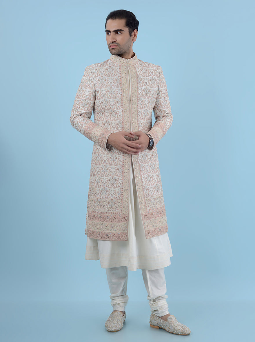 Elevate your wedding style with this Cream Multi Sherwani, tailored from luxurious silk with beautiful embroidery, perfect for modern grooms in the USA aiming for a timeless and elegant look.