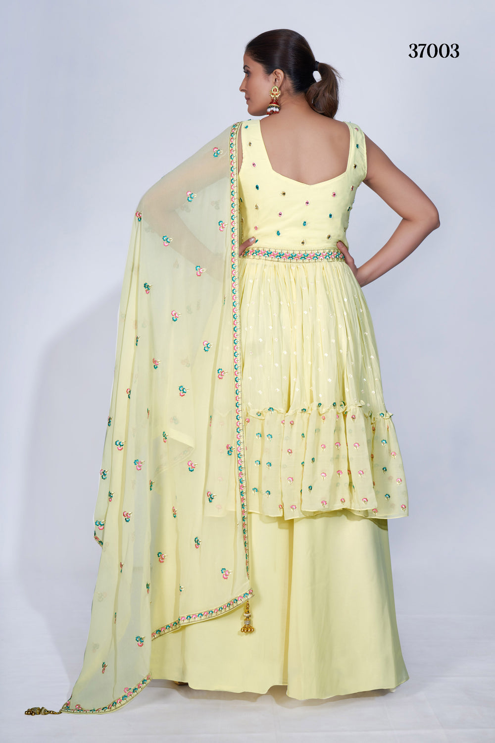 Stylish Yellow Mirror Work Palazzo Suit with Flared Chiffon Bottom & Elegant Multi Embroidery for Parties.