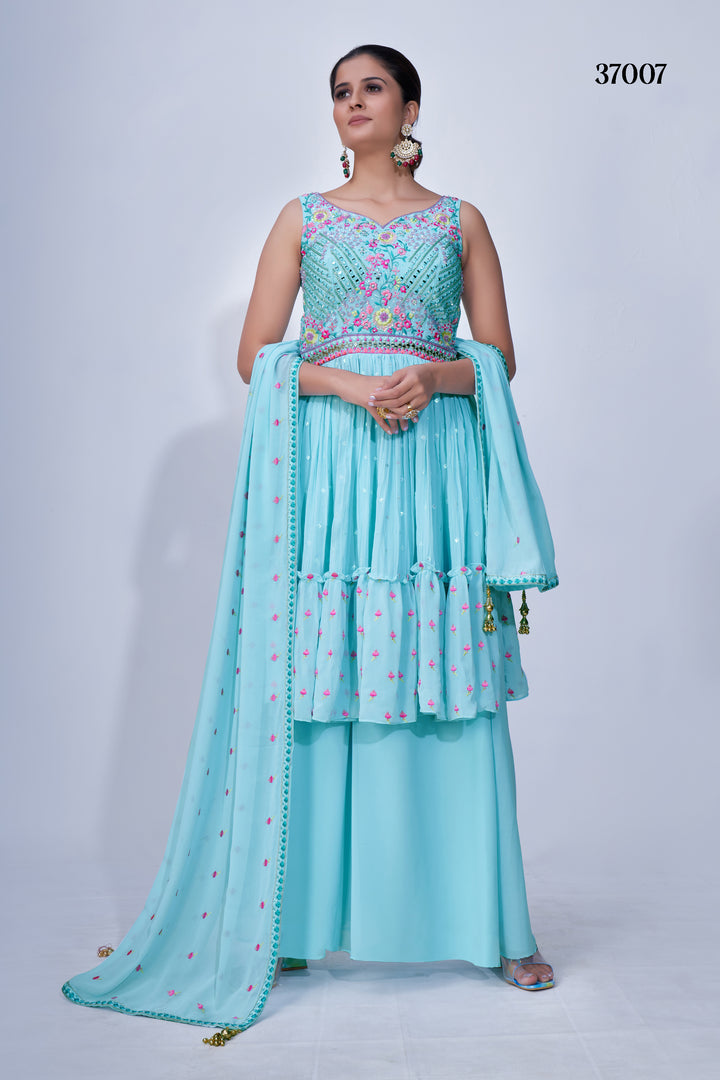 Sky blue multi embroidery chiffon palazzo suit with lace and butti work on the dupatta, ideal for special occasions.