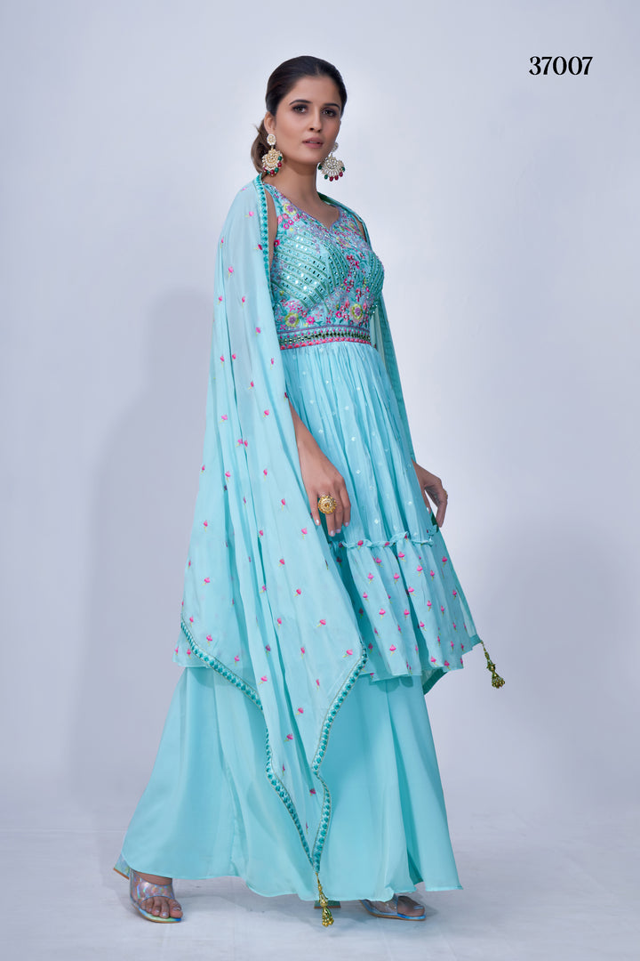 Designer sky blue chiffon palazzo suit with mirror work and satin-lined palazzo, perfect for wedding season.