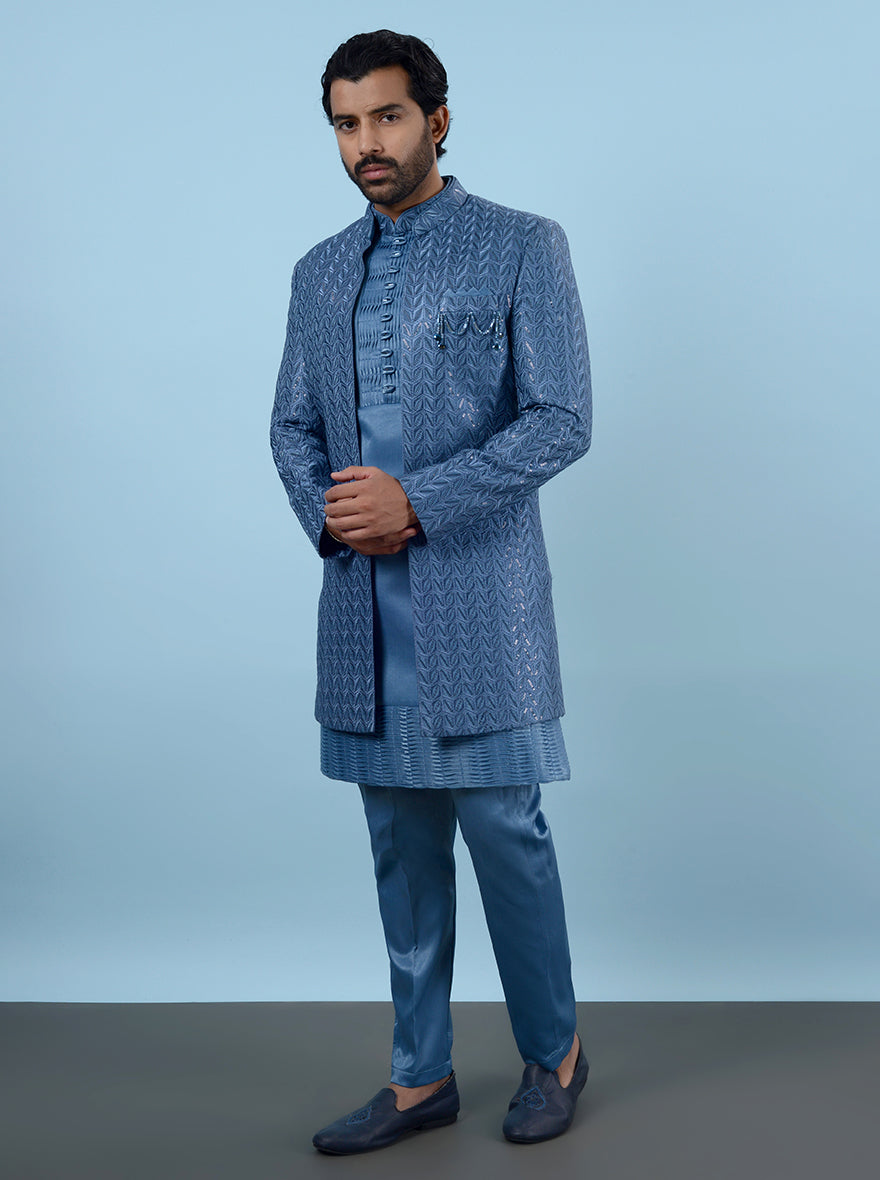 Celebrate in style at sangeet events in the USA with this stylish Blue Indowestern, featuring soft silk blend fabric and gorgeous embroidery, ideal for special occasions.