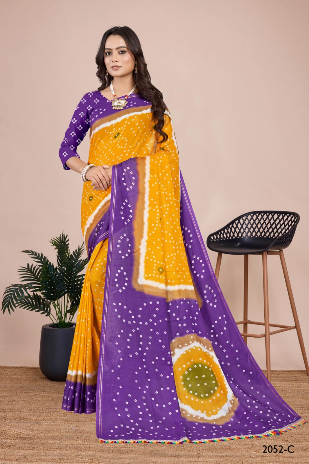 Beautiful rama Bandhani saree with delicate tie-dye work, designed for bridal and cultural gatherings in the USA.