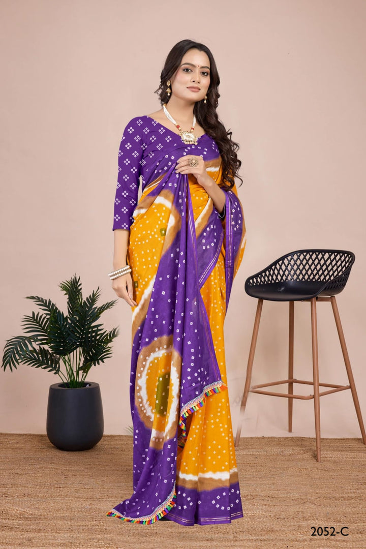 Chic rama handcrafted Bandhani saree with an elegant tie-dye pattern, ideal for special occasions and weddings.