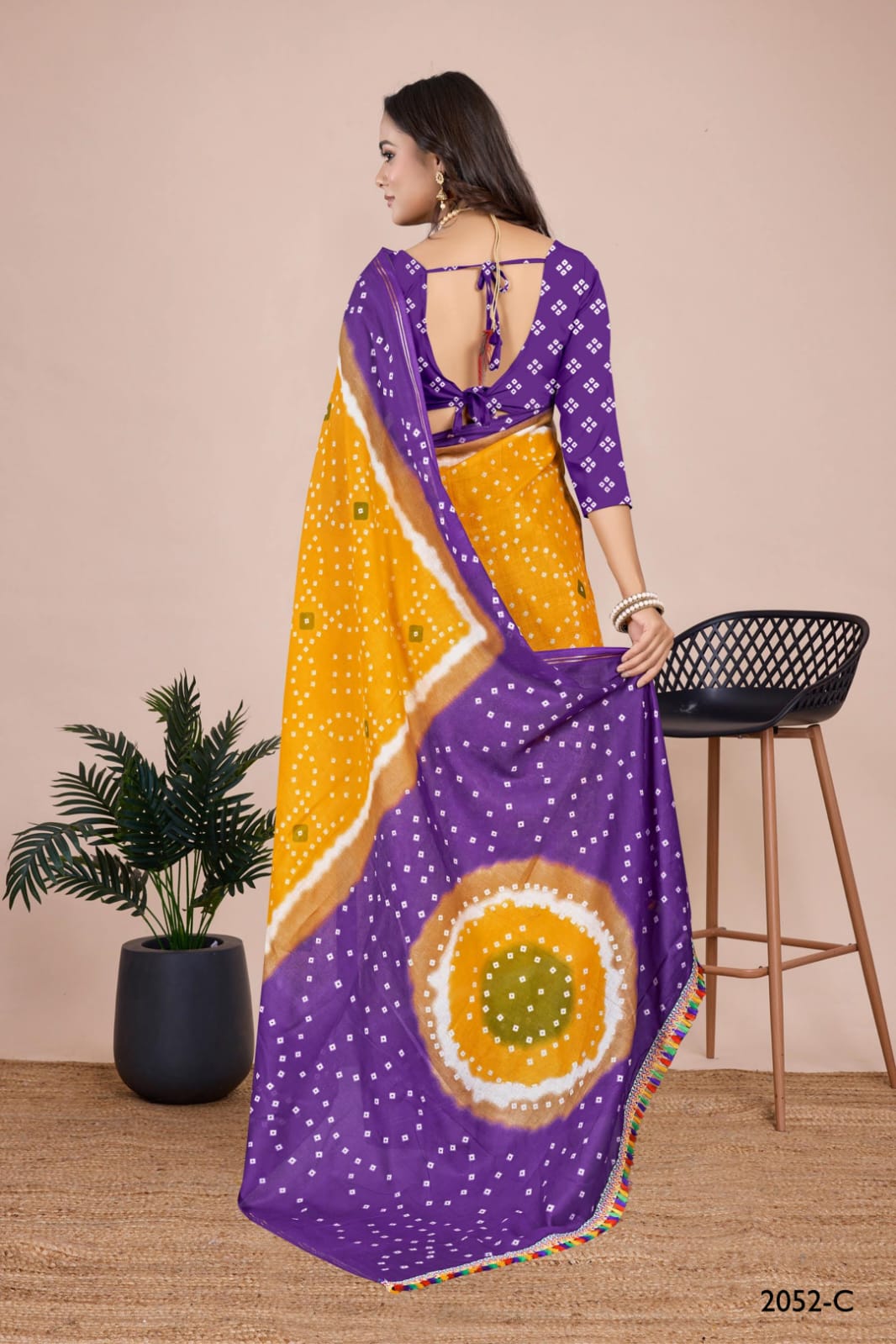 Traditional rama Bandhani saree featuring intricate tie-dye work, perfect for weddings and cultural events in the USA.