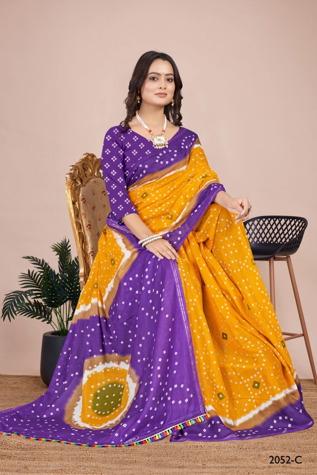 Stunning rama handcrafted Bandhani saree with a unique tie-dye pattern, designed for brides and festive celebrations.