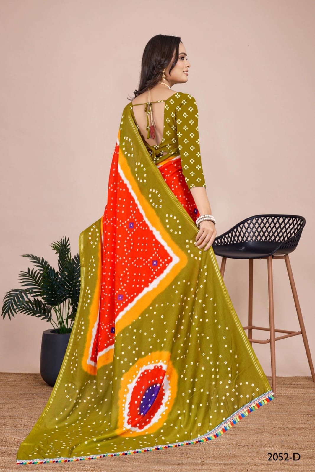 Traditional yellow Bandhani saree featuring exquisite tie-dye designs, ideal for wedding and festive celebrations.