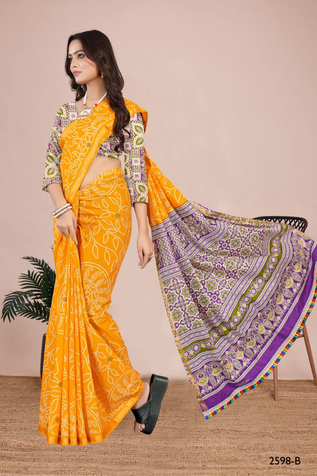 Stunning olive handcrafted Bandhani saree with intricate tie-dye patterns, ideal for cultural celebrations and weddings.