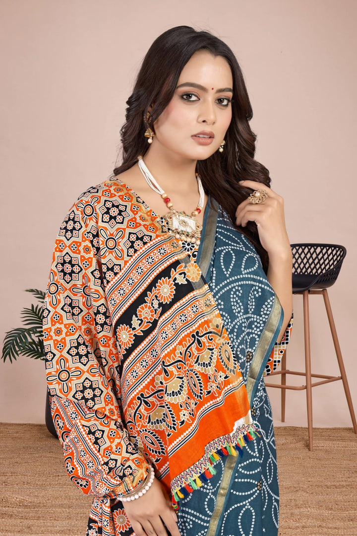 Traditional red Bandhani saree with intricate tie-dye work, designed for weddings and festive celebrations in the USA.