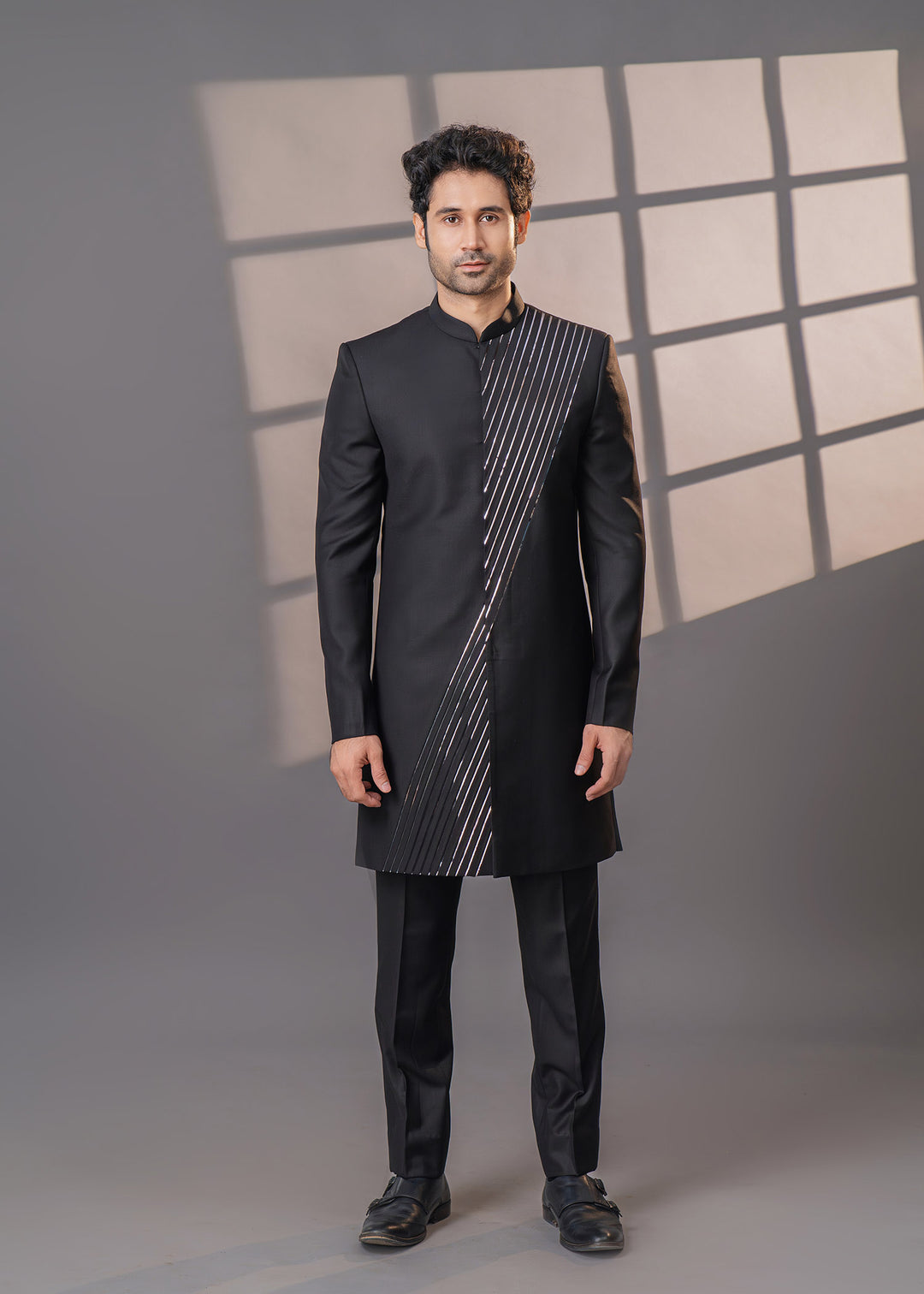 Embrace the charm of modern design with our sleek black Indo-Western outfit, ideal for fashionable gatherings.