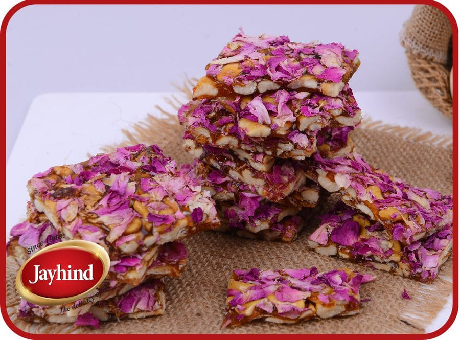 Delicious Rose Chikki made with premium jaggery, fragrant rose petals, and crunchy nuts – a perfect floral treat.